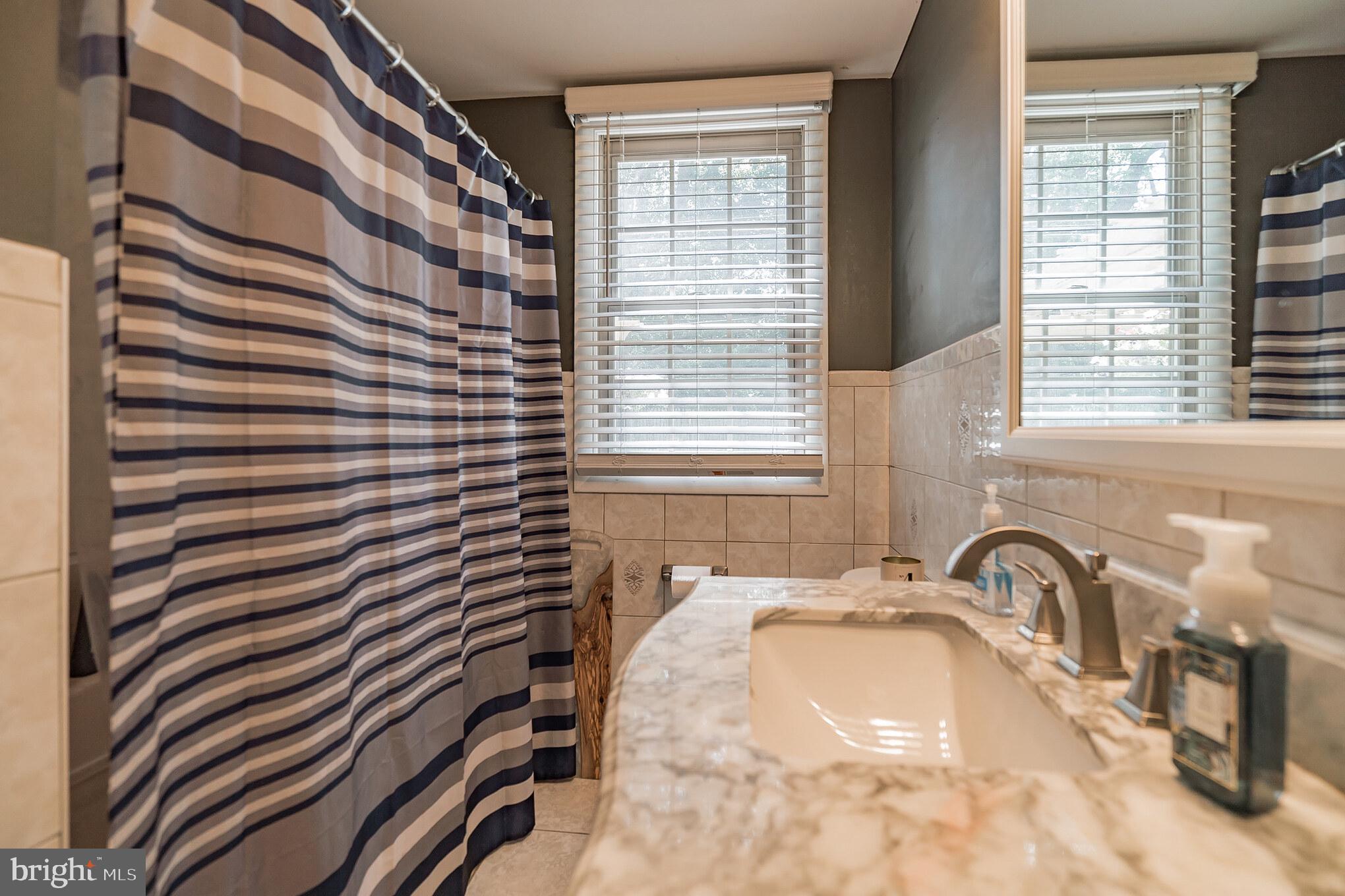 3239 Maple Road Huntingdon Valley, PA 19006 - Photo 14 of 31 Updated full bath on main level.