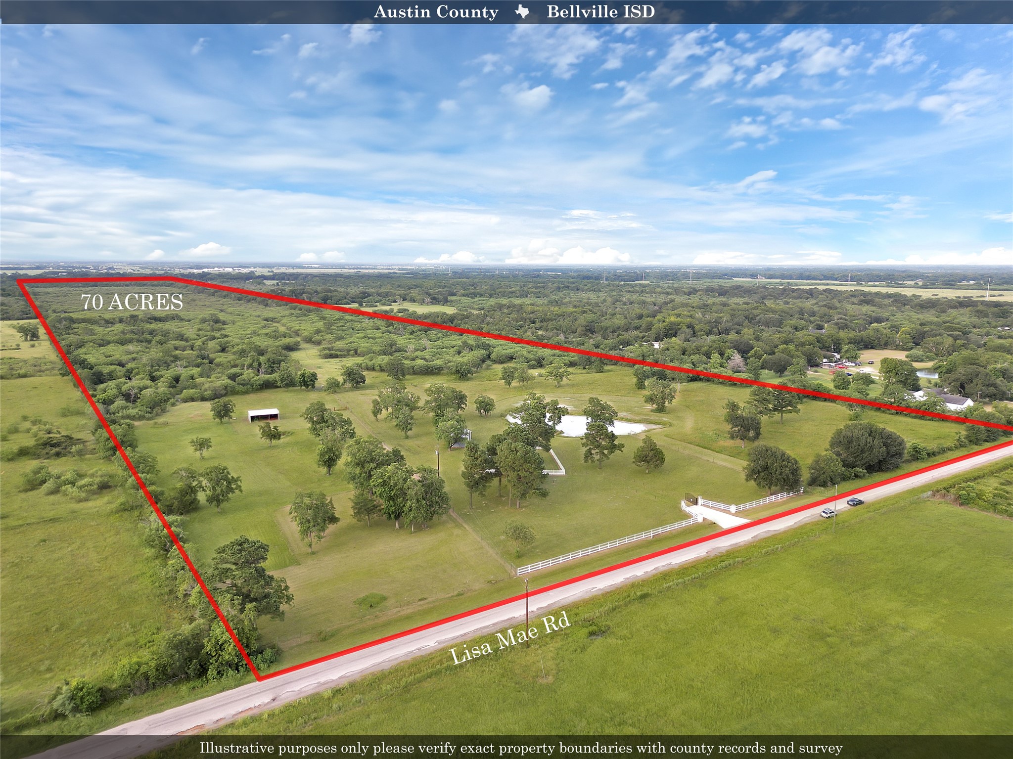 868 Lisa May Road Bellville, TX 77418 - Photo 32 of 39 Welcoming open frontage area that complements the natural surroundings of this expansive acreage.
