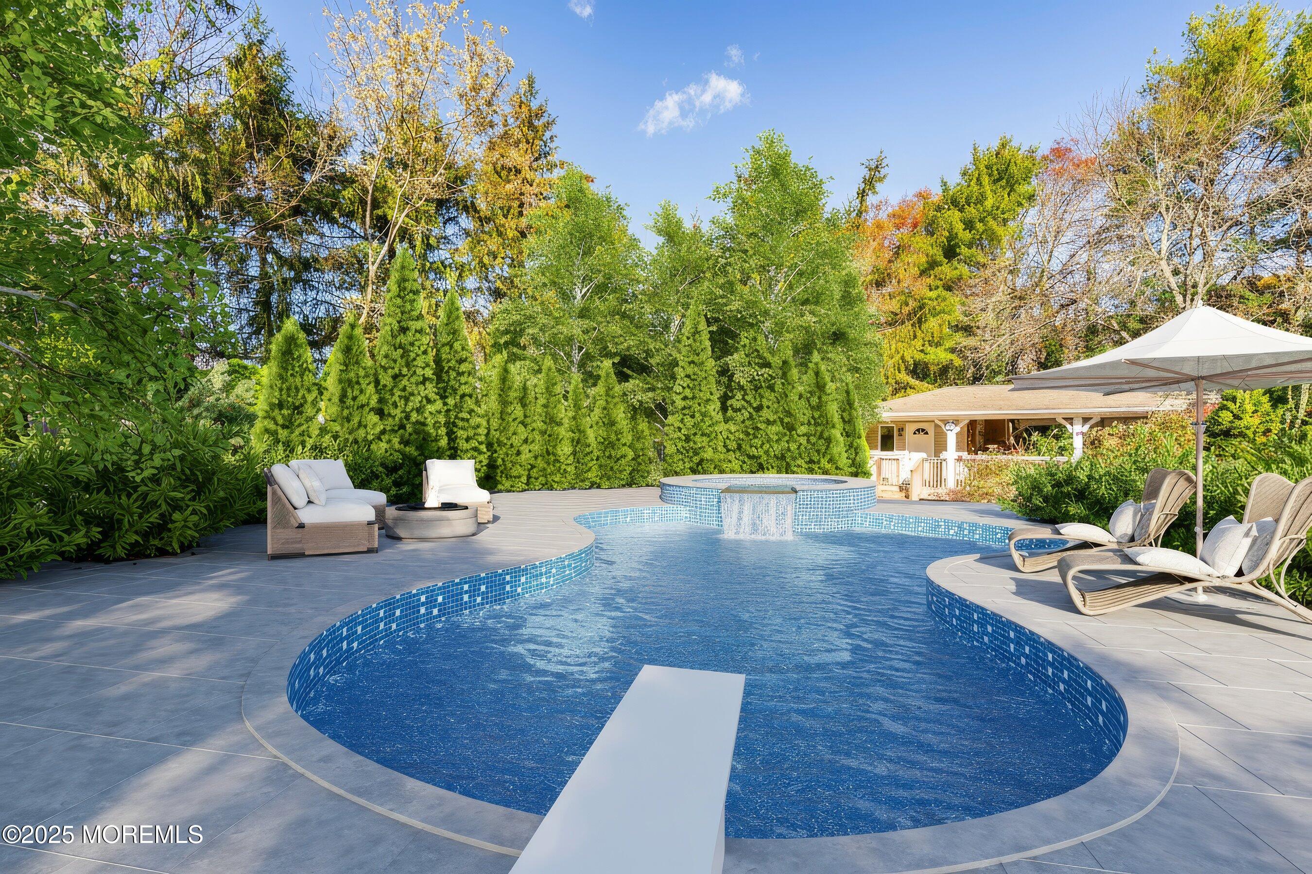 677 Overlook Court Brick, NJ 08724 - Photo 26 of 26 swimming pool view with a seating space