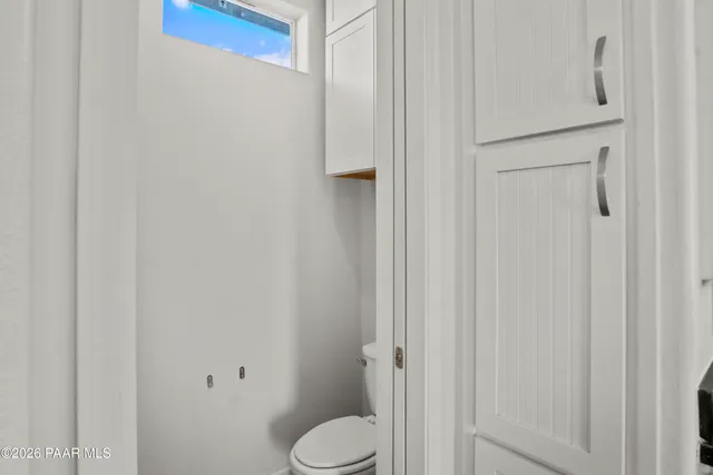 a view of a storage room with racks