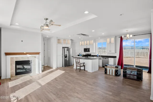 a kitchen with stainless steel appliances a sink stove and refrigerator