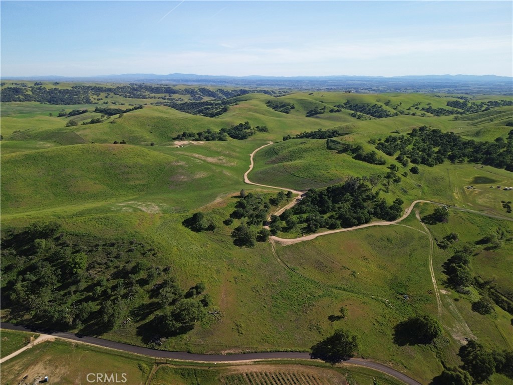 77505 Reinert Road San Miguel, CA 93451 - Photo 7 of 29 a view of a lake with a mountain in the background