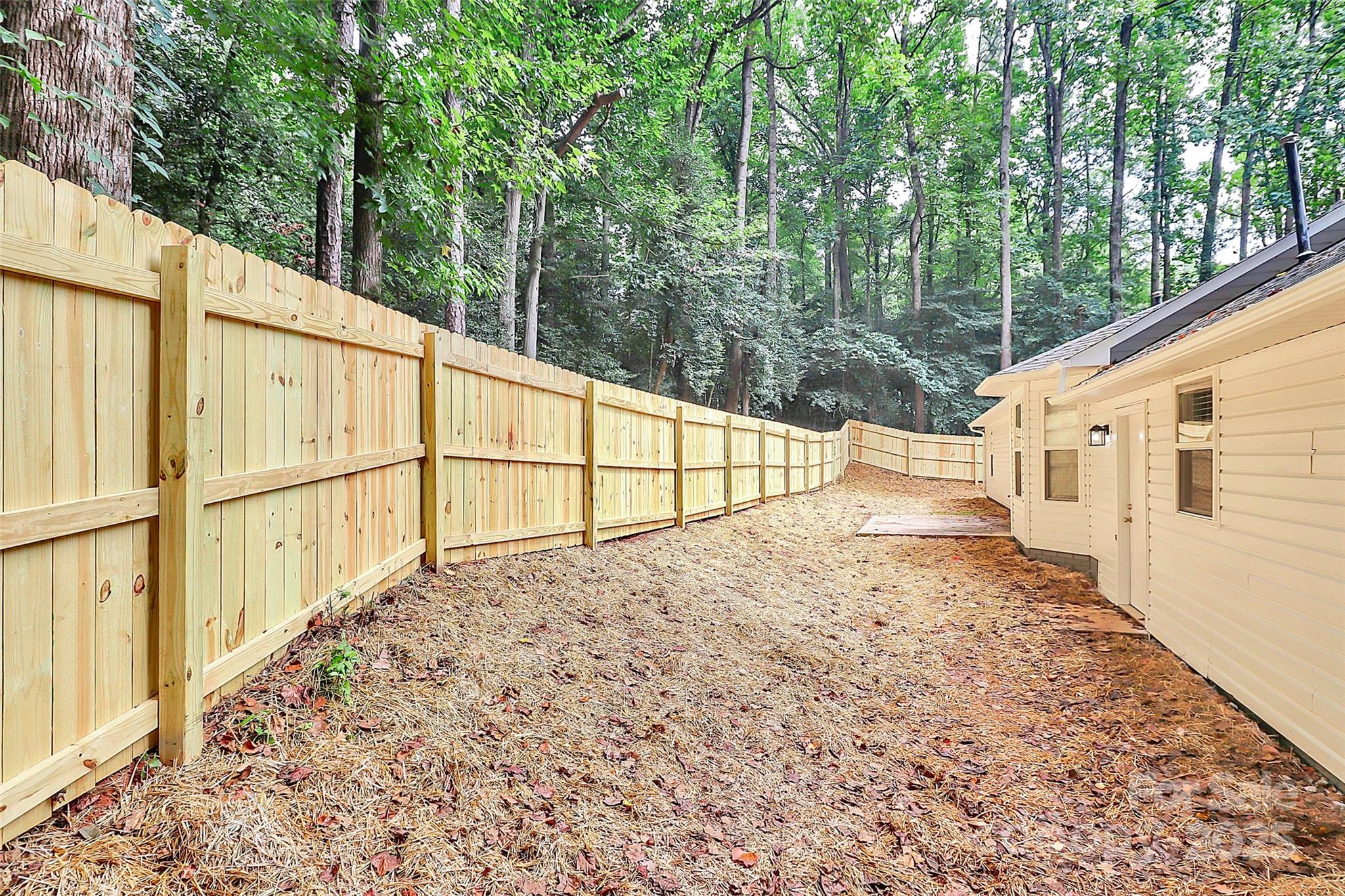 1540 Nichole Lane Fort Mill, SC 29708 - Photo 28 of 33 a view of a house with a backyard