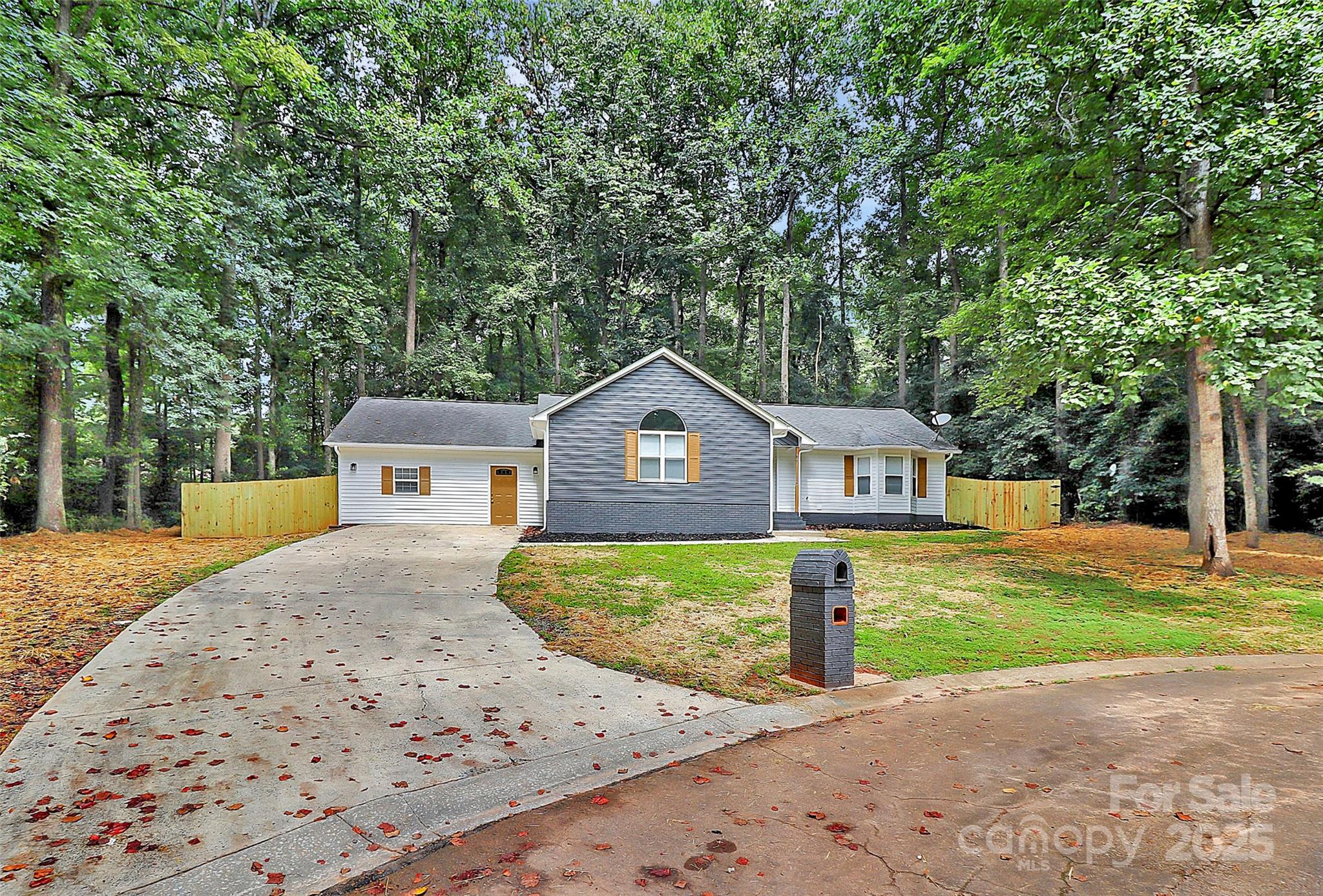1540 Nichole Lane Fort Mill, SC 29708 - Photo 33 of 33 a front view of a house with a yard and large trees
