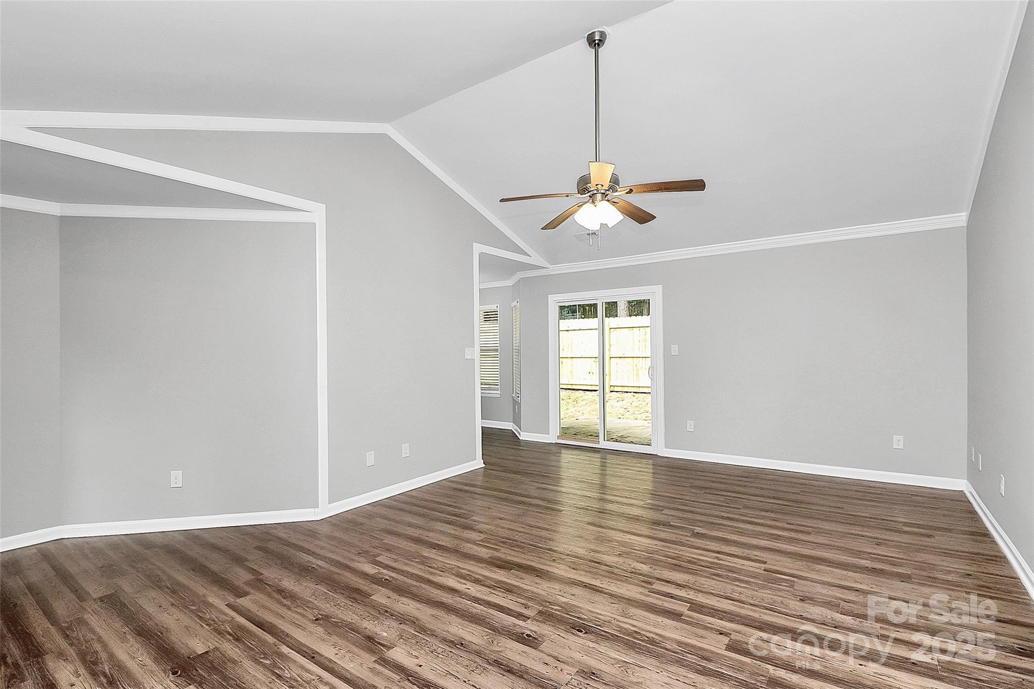 1540 Nichole Lane Fort Mill, SC 29708 - Photo 6 of 33 a view of an empty room with wooden floor and a window