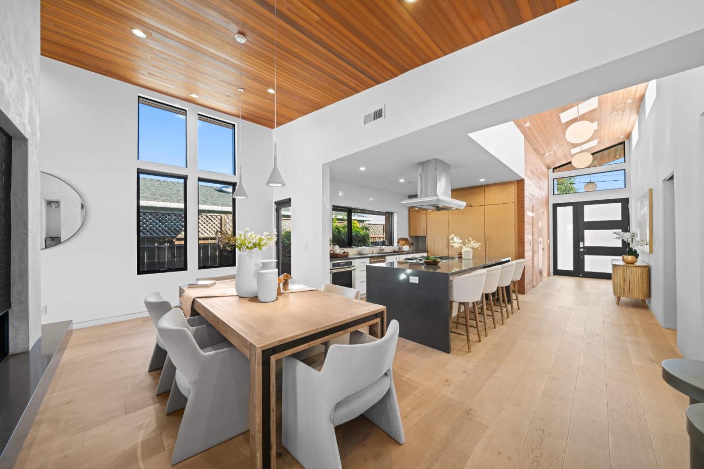 359 Stowell Avenue Sunnyvale, CA 94085 - Photo 12 of 53 a dining hall with stainless steel appliances kitchen island granite countertop a stove and a refrigerator