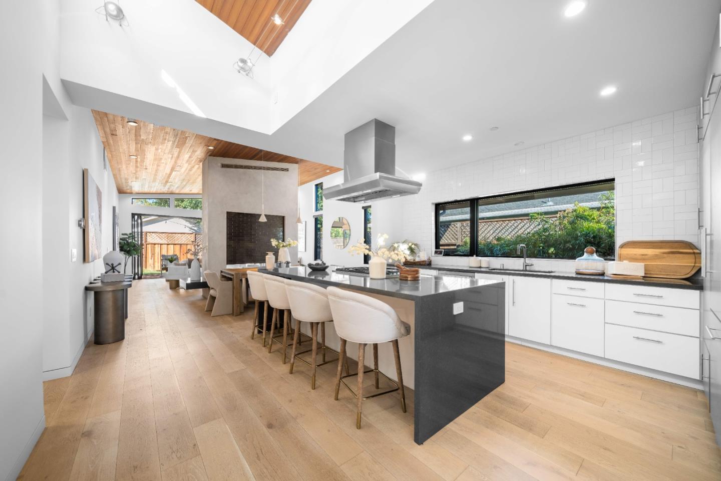 359 Stowell Avenue Sunnyvale, CA 94085 - Photo 13 of 53 a large kitchen with lots of counter space and stainless steel appliances