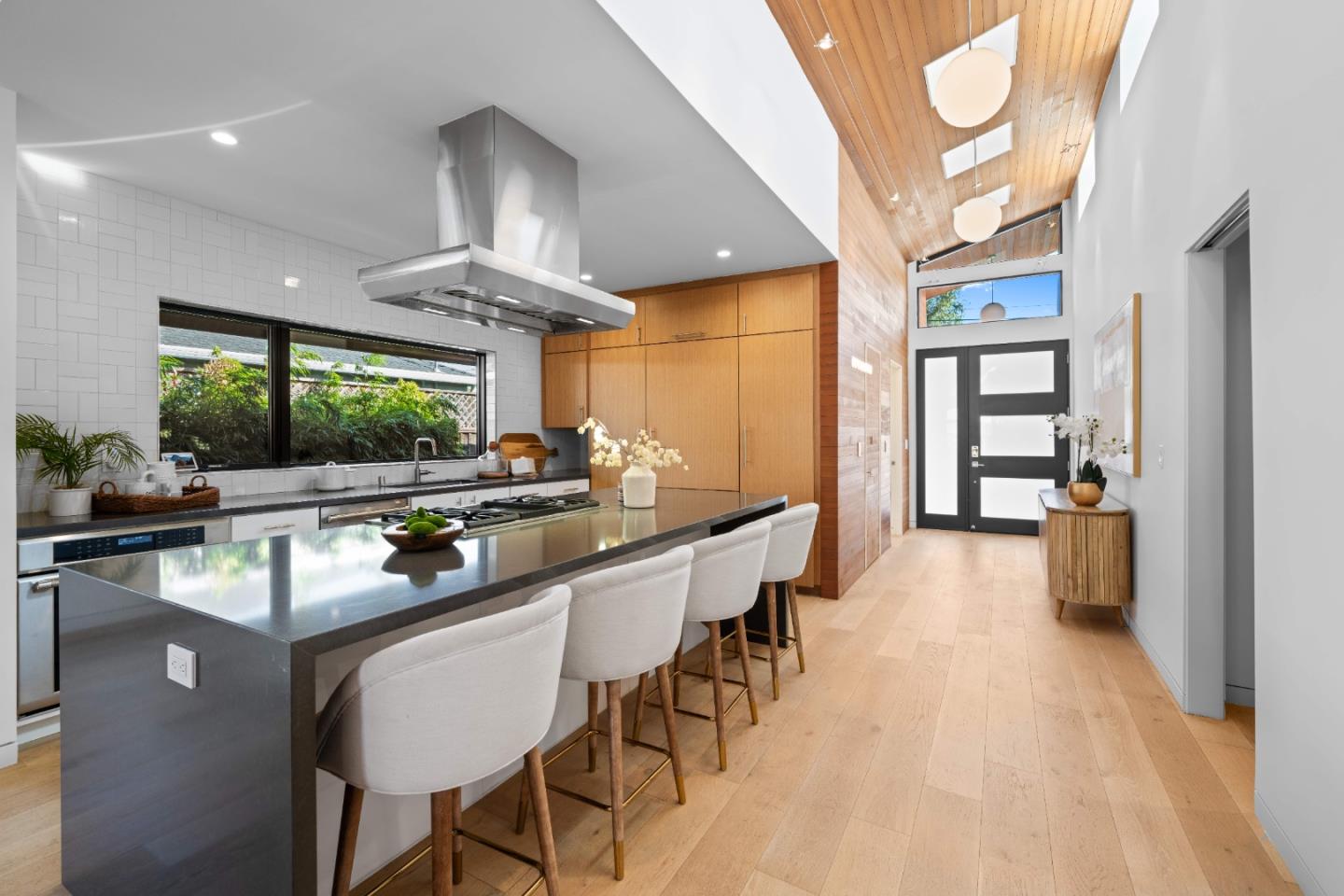 359 Stowell Avenue Sunnyvale, CA 94085 - Photo 14 of 53 a kitchen with stainless steel appliances granite countertop a stove and a view of living room