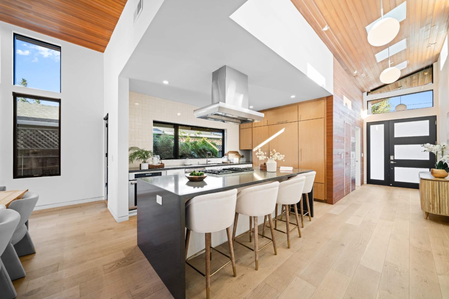 359 Stowell Avenue Sunnyvale, CA 94085 - Photo 16 of 53 a kitchen with stainless steel appliances kitchen island granite countertop a sink and cabinets