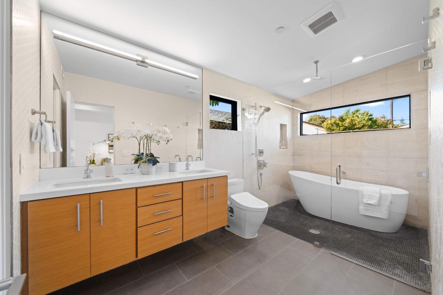 359 Stowell Avenue Sunnyvale, CA 94085 - Photo 23 of 53 a bathroom with a toilet sink and mirror