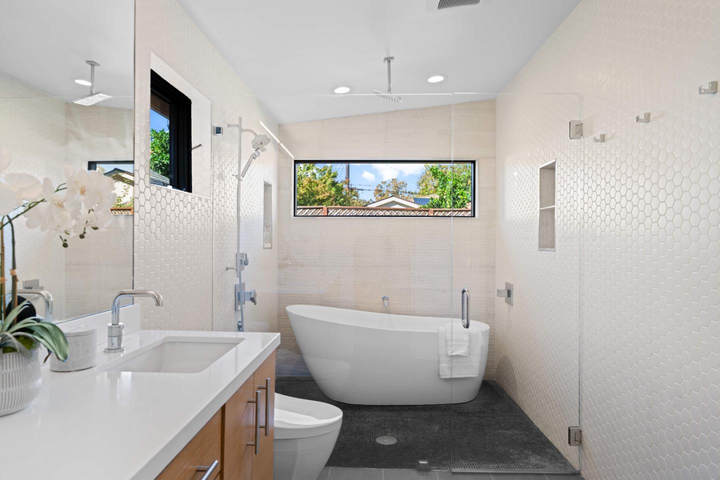 359 Stowell Avenue Sunnyvale, CA 94085 - Photo 24 of 53 a bathroom with a toilet sink and mirror