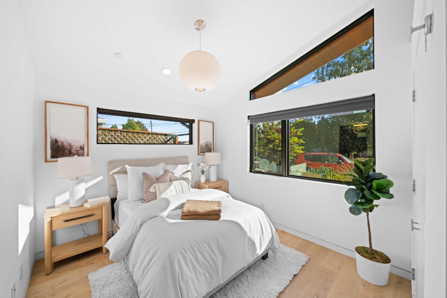 359 Stowell Avenue Sunnyvale, CA 94085 - Photo 26 of 53 a bedroom with bed and a potted plant