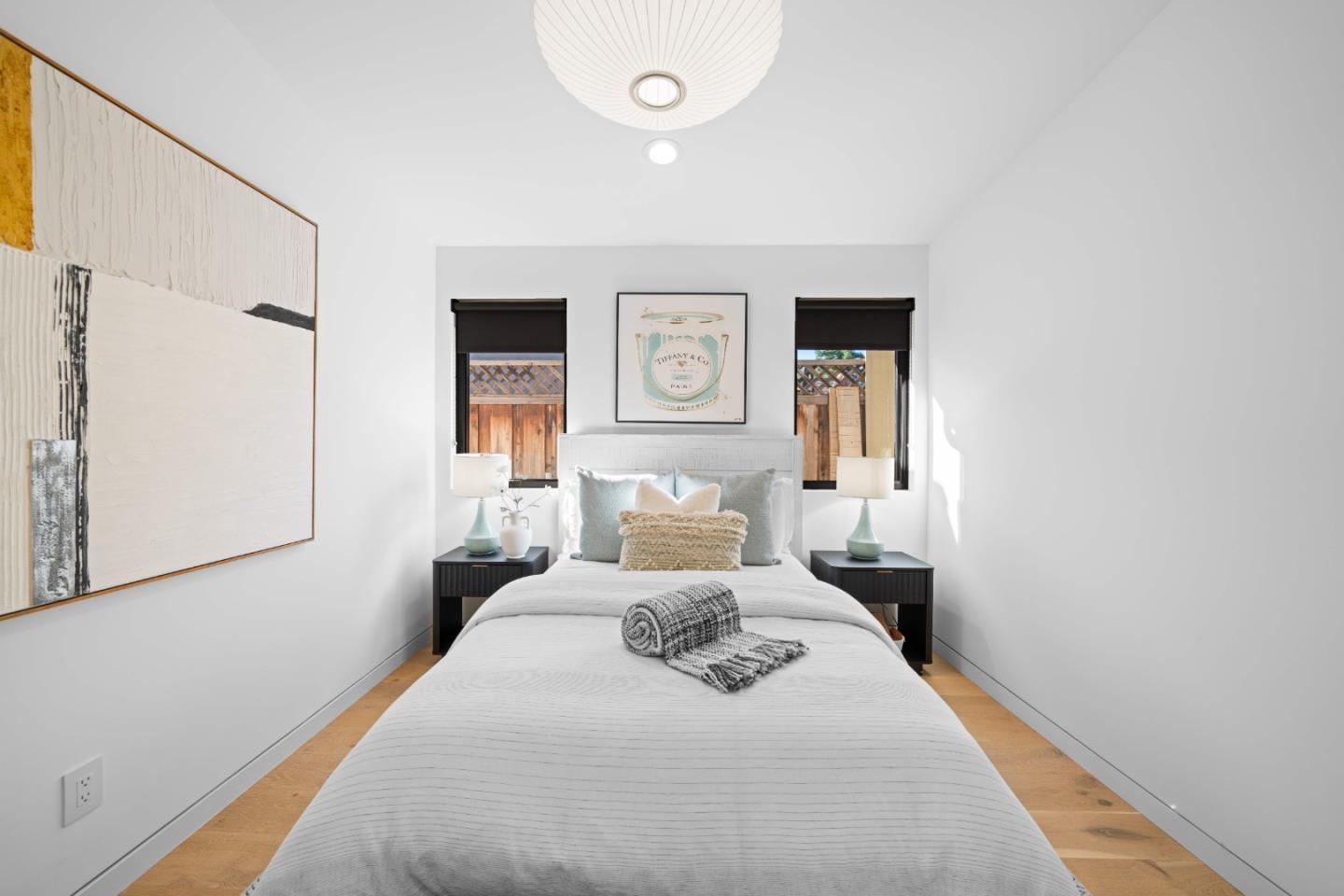 359 Stowell Avenue Sunnyvale, CA 94085 - Photo 30 of 53 a bedroom with a large bed and a window