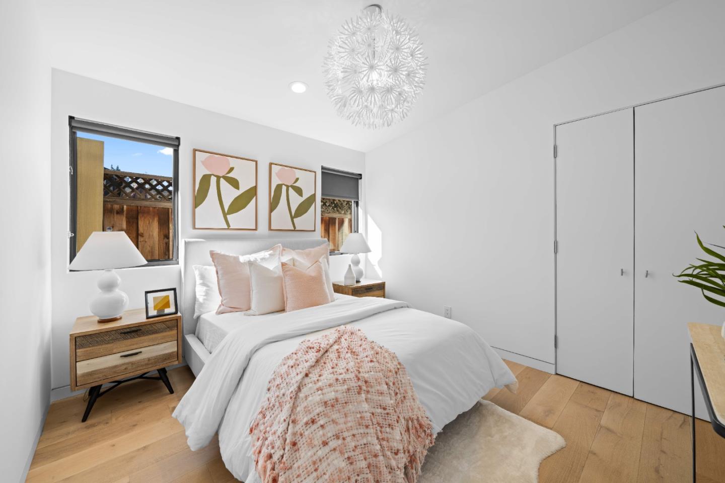 359 Stowell Avenue Sunnyvale, CA 94085 - Photo 31 of 53 a bedroom with a bed and a chandelier