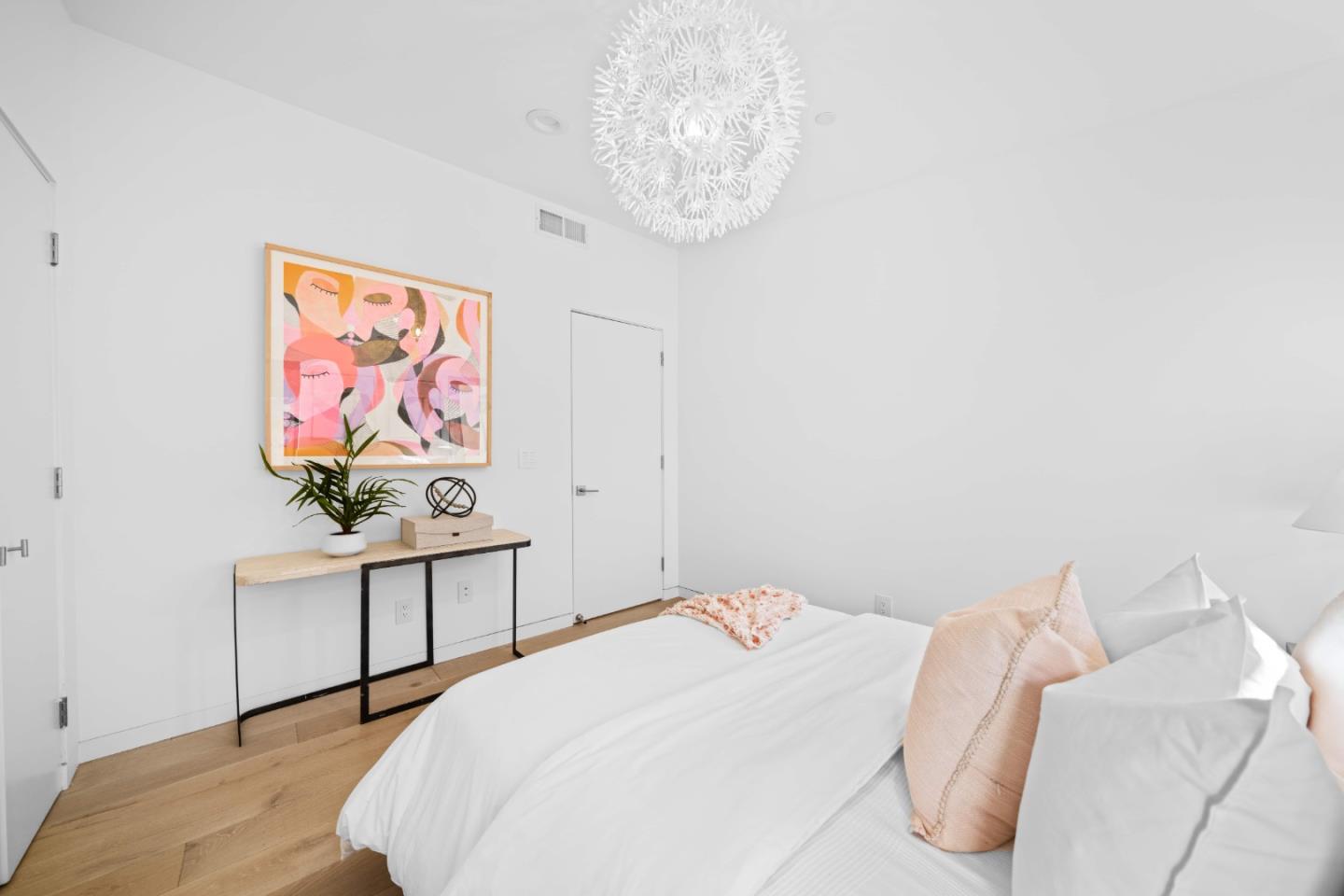 359 Stowell Avenue Sunnyvale, CA 94085 - Photo 32 of 53 a bedroom with a bed and a painting on the wall