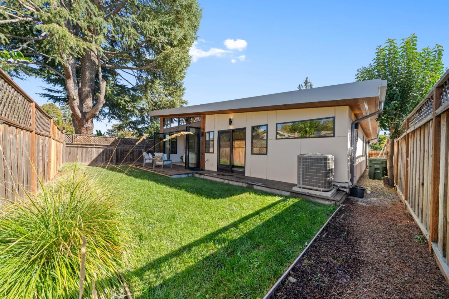 359 Stowell Avenue Sunnyvale, CA 94085 - Photo 37 of 53 a view of a house with backyard and a tree