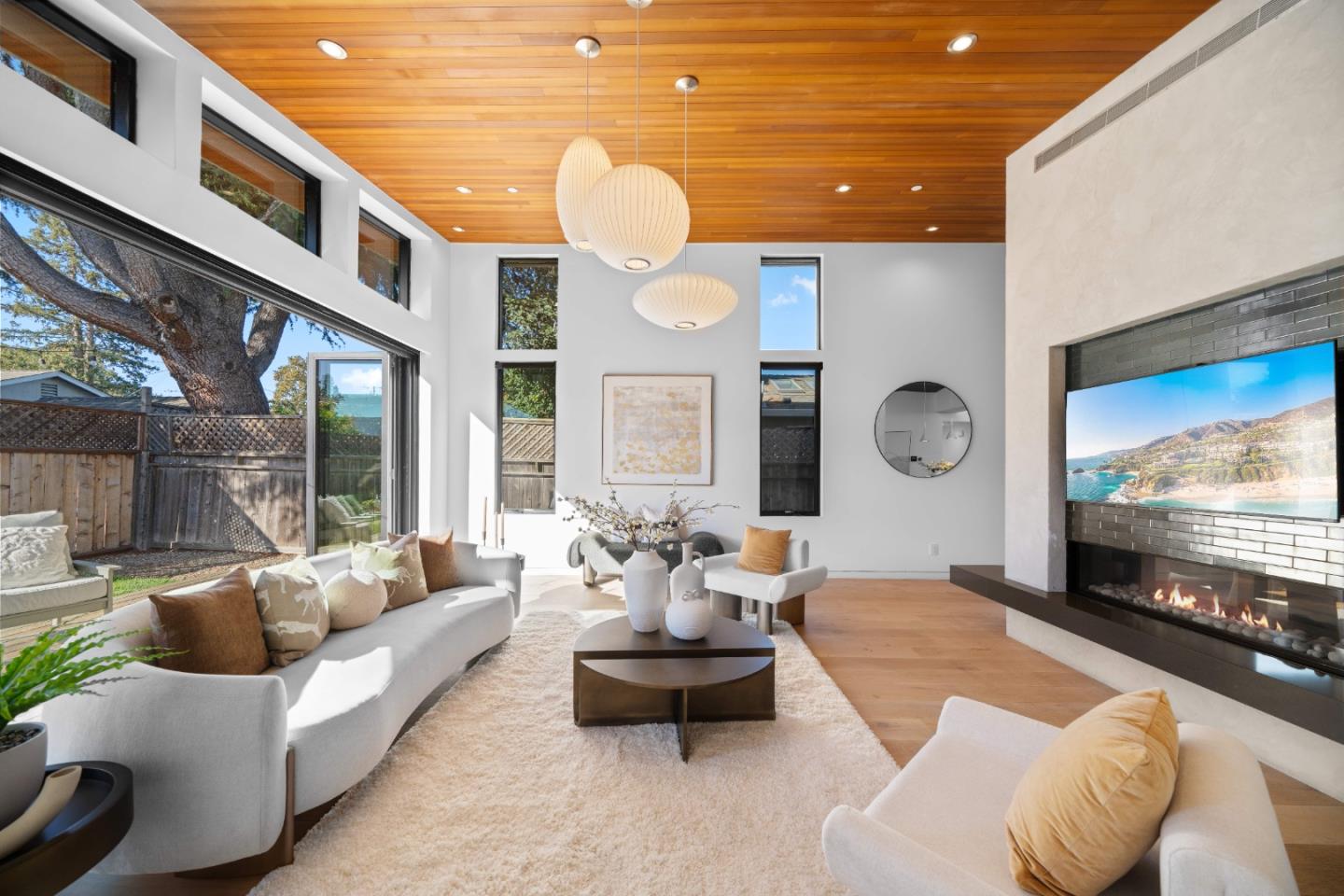 359 Stowell Avenue Sunnyvale, CA 94085 - Photo 4 of 53 a living room with furniture and a flat screen tv