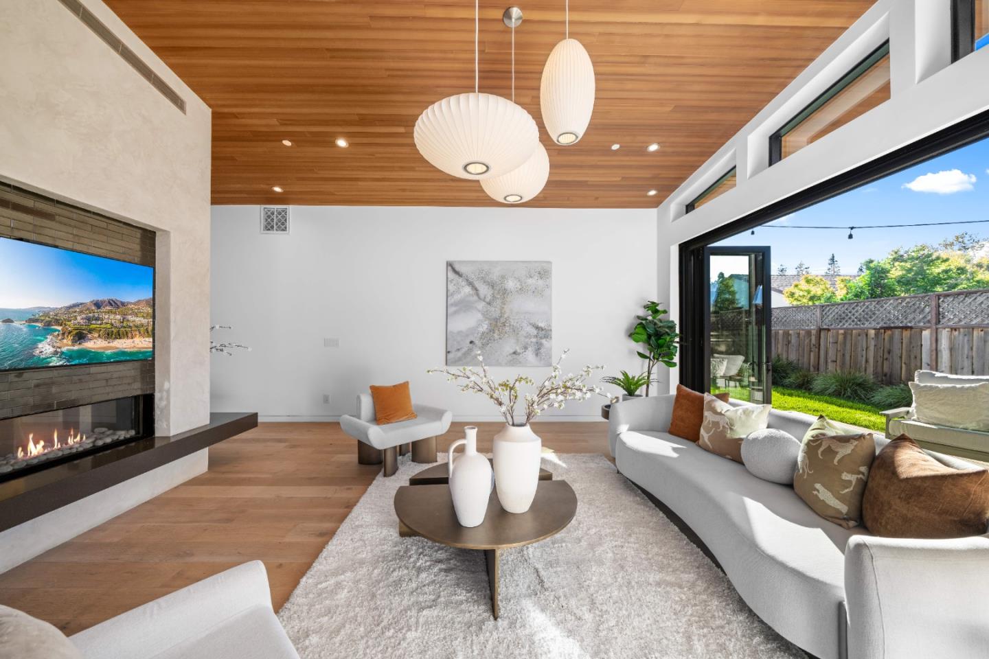 359 Stowell Avenue Sunnyvale, CA 94085 - Photo 6 of 53 a living room with furniture and a flat screen tv