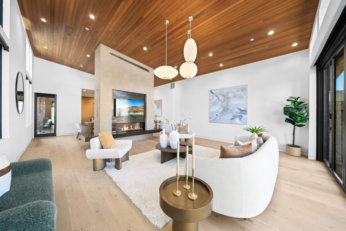 359 Stowell Avenue Sunnyvale, CA 94085 - Photo 7 of 53 a living room with furniture a chandelier and a large window