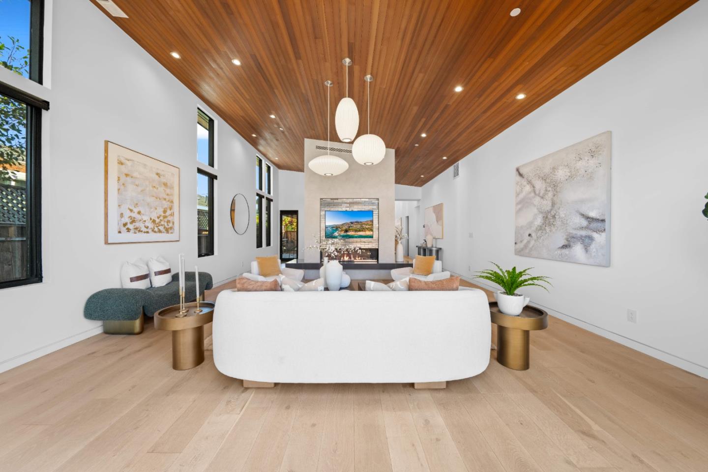 359 Stowell Avenue Sunnyvale, CA 94085 - Photo 9 of 53 a view of a dining room with furniture a chandelier and wooden floor