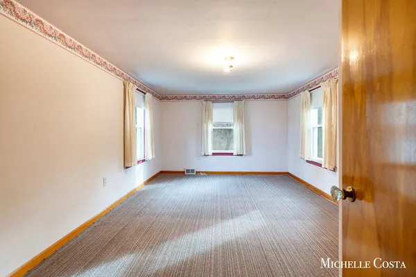 $290,000 | 13100 Grand River Drive Southeast, Lowell, MI 49331