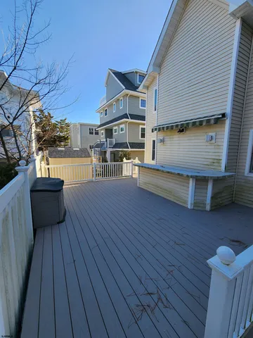 a view of a terrace with wooden floor