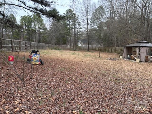 2019 Haire Road Fort Mill, SC 29715 - Photo 15 of 16 a backyard of a house with table and chairs