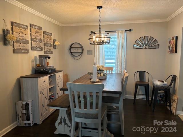 2019 Haire Road Fort Mill, SC 29715 - Photo 4 of 16 a view of a dining room with furniture a chandelier and wooden floor