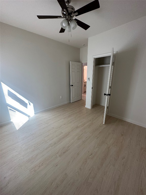 23081 Nameless Road, Unit I Leander, TX 78641 - Photo 11 of 15 a view of an empty room with a window