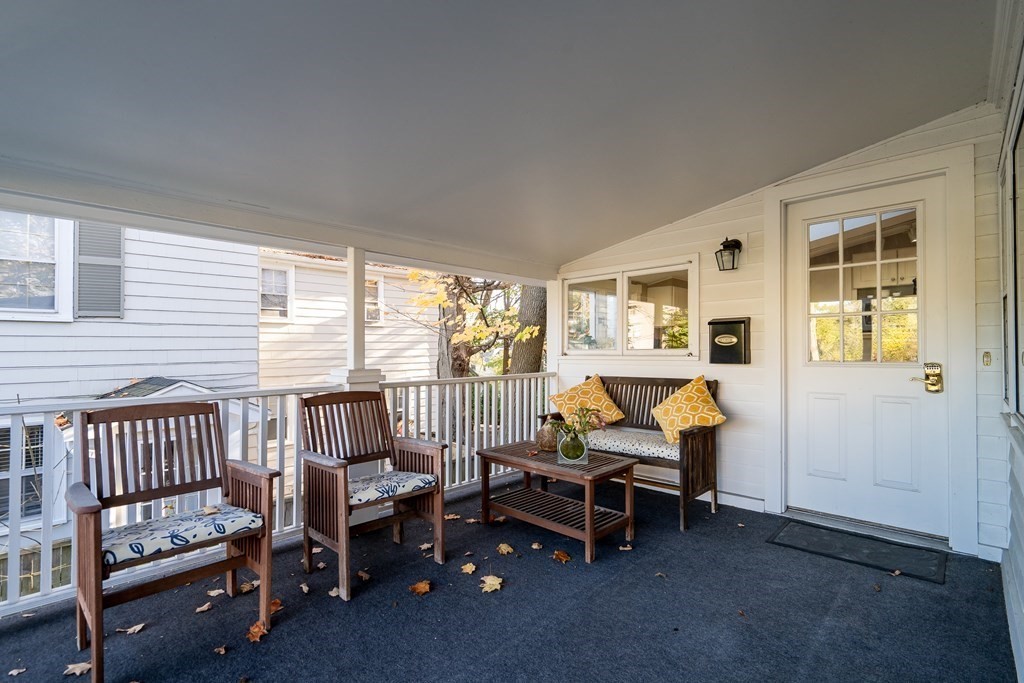 176 Pleasant Street Arlington, MA 02476 - Photo 16 of 41 a view of a livingroom with furniture and windows