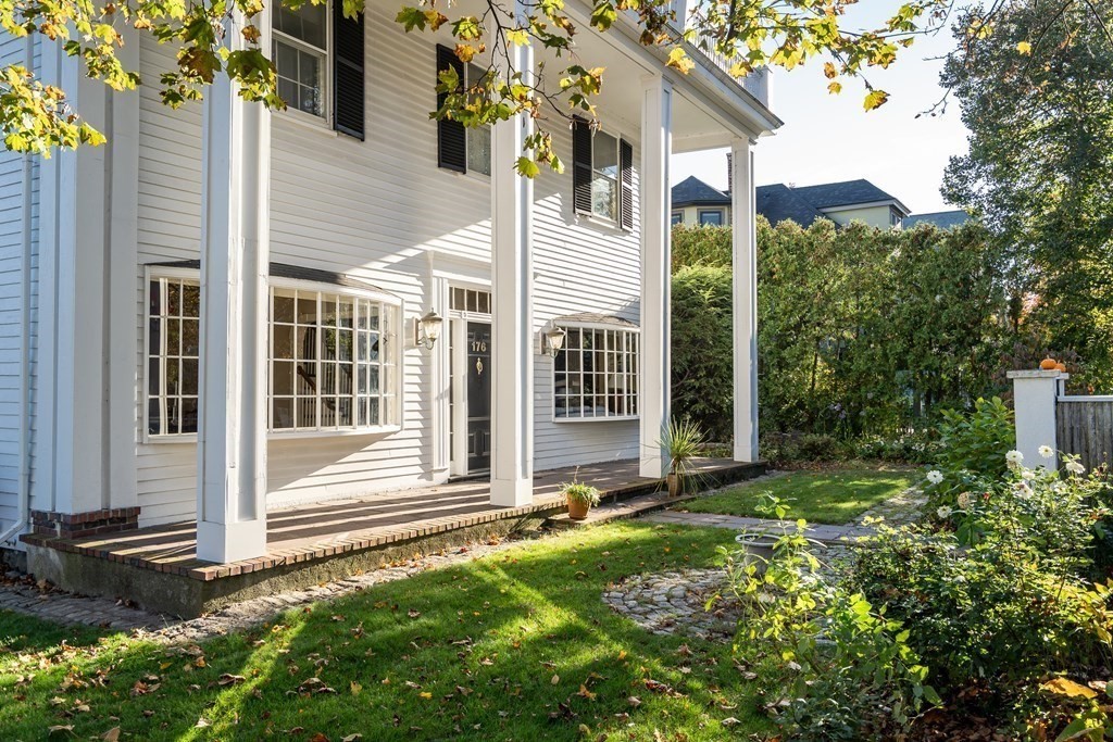176 Pleasant Street Arlington, MA 02476 - Photo 35 of 41 a view of a back yard of the house