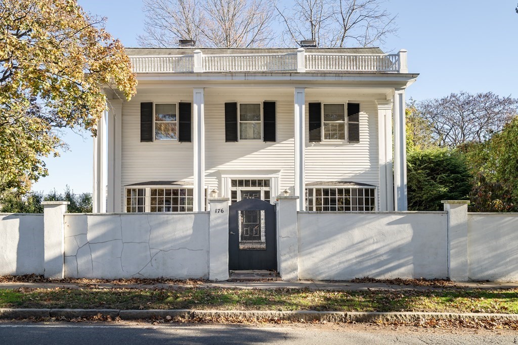 176 Pleasant Street Arlington, MA 02476 - Photo 36 of 41 a view of a house with a yard