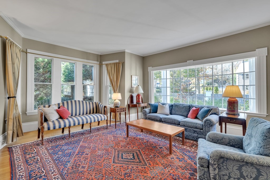 176 Pleasant Street Arlington, MA 02476 - Photo 4 of 41 a living room with furniture and a large window