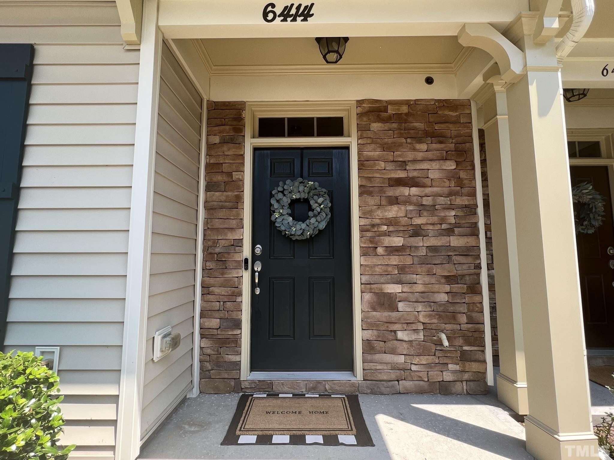6414 Swatner Drive Raleigh, NC 27612 - Photo 19 of 21 a front view of a house with entryway