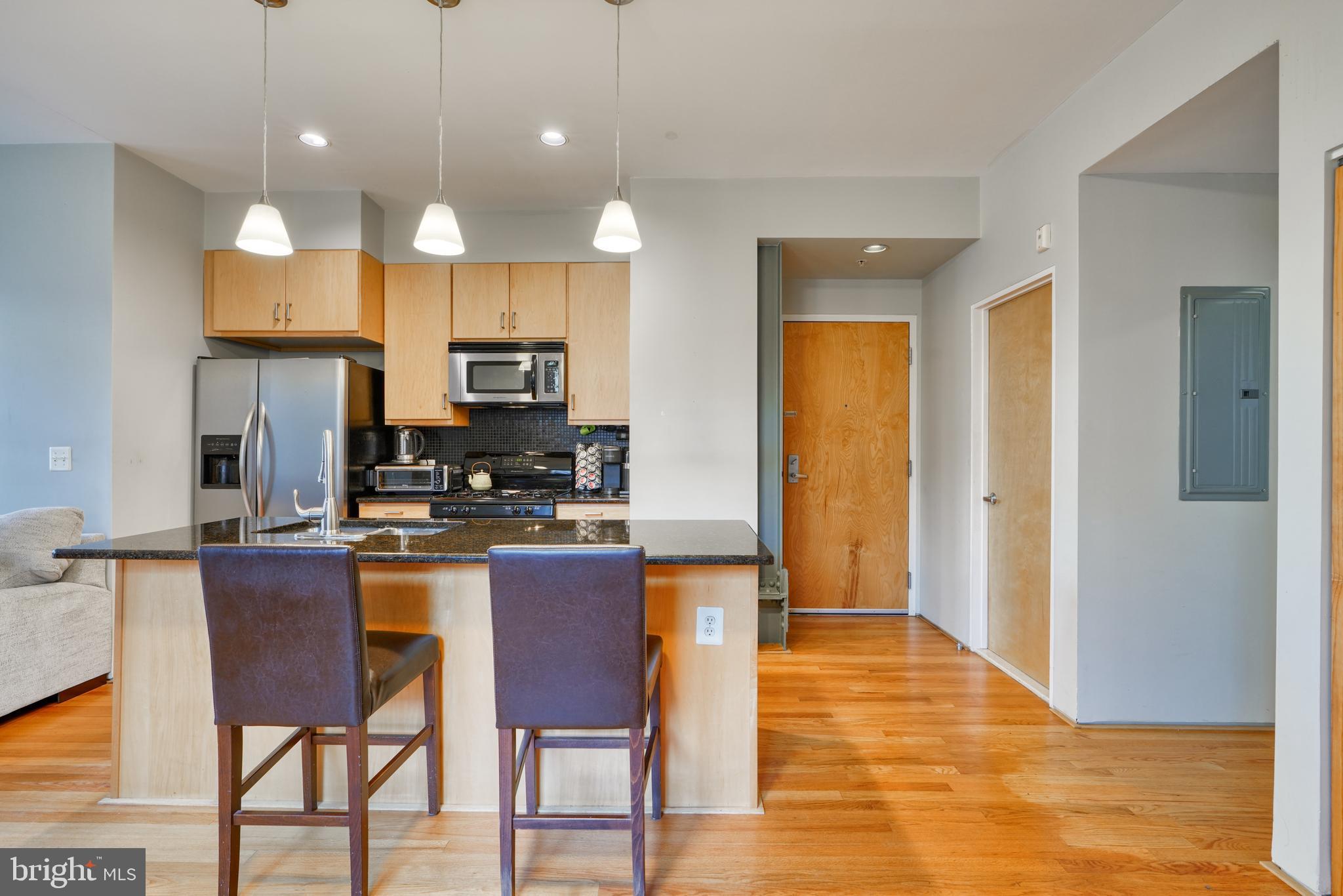 104 West Madison Street, Unit 7 Baltimore, MD 21201 - Photo 16 of 30 Kitchen stools come with condo