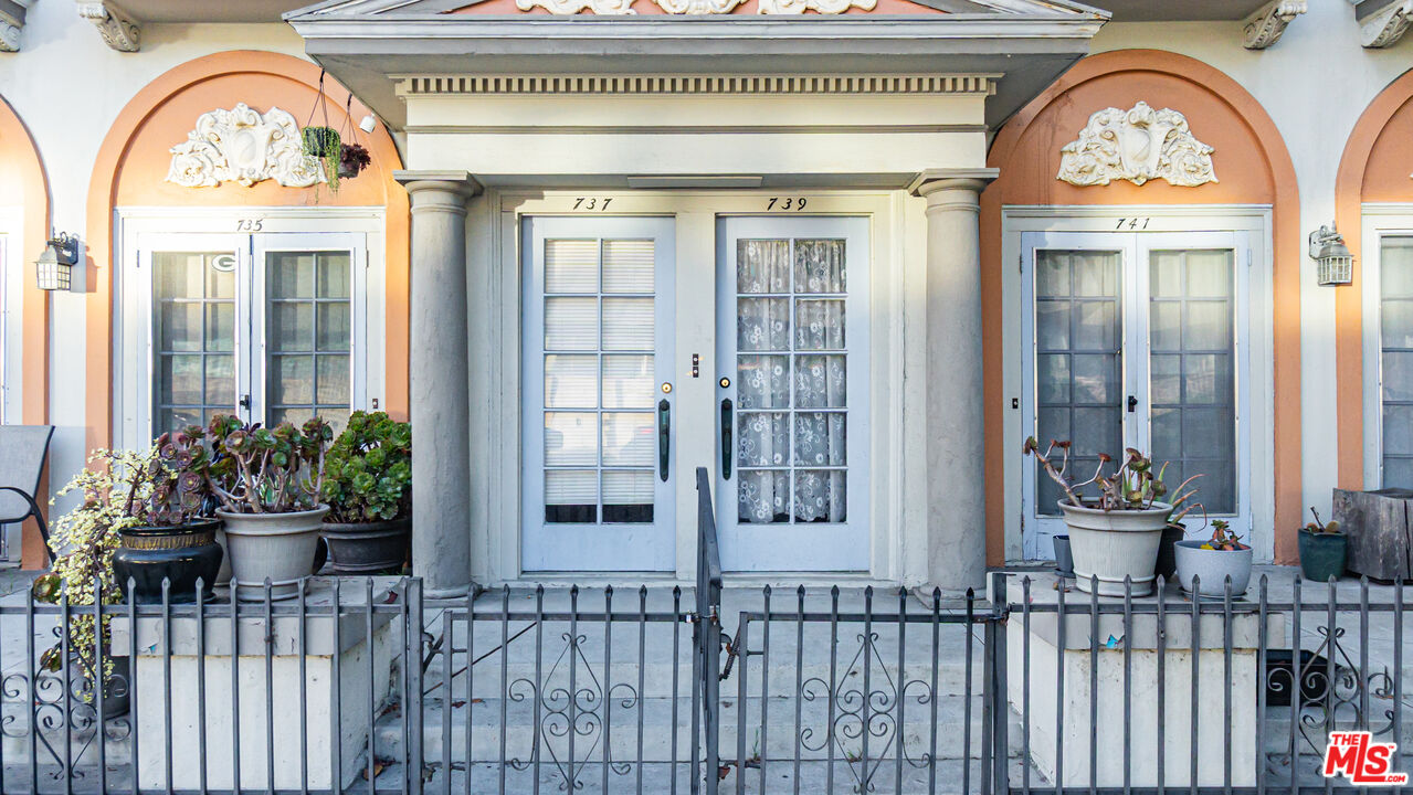 735 Locust Avenue Long Beach, CA 90813 - Photo 3 of 46 a view of a entryway door of the house