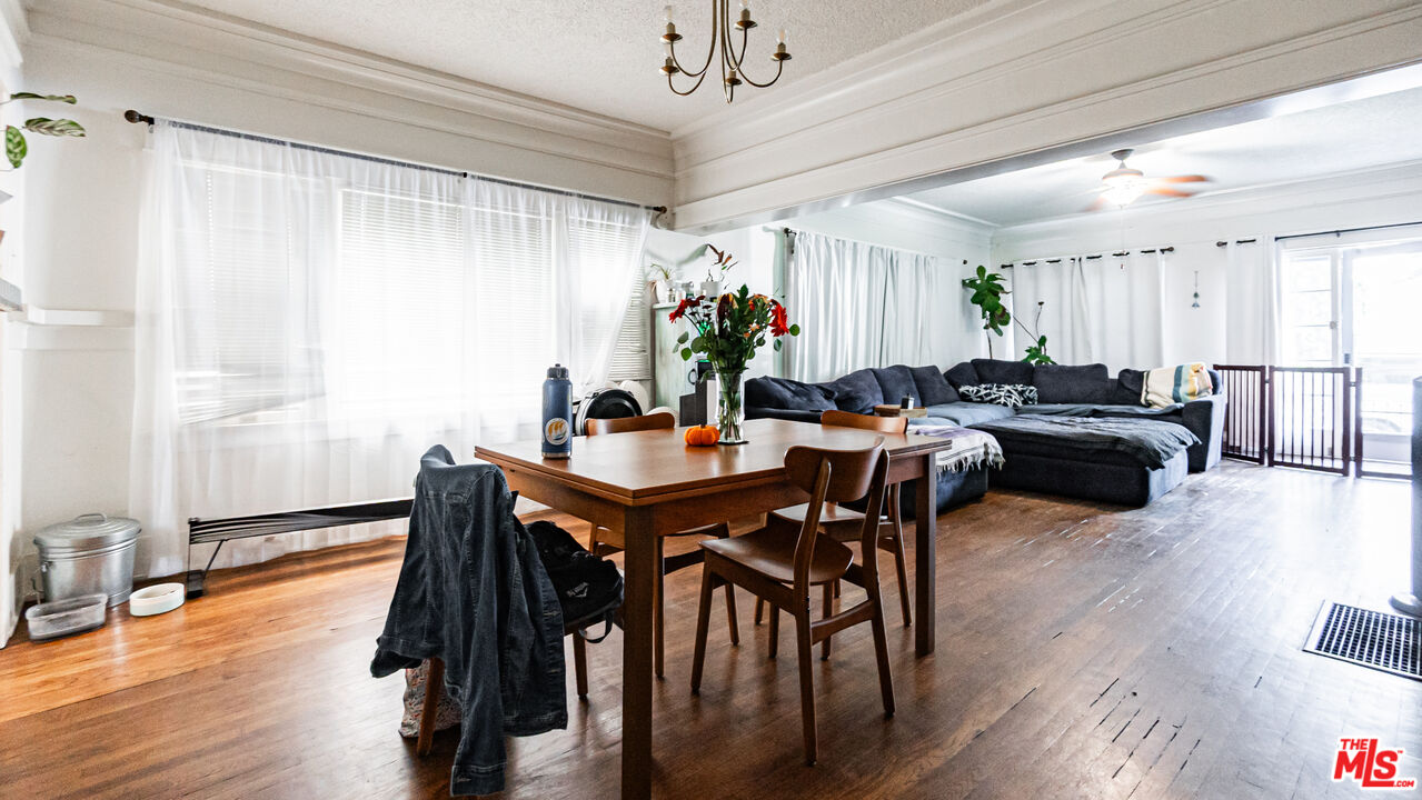 735 Locust Avenue Long Beach, CA 90813 - Photo 33 of 46 a view of a dining room with furniture window and wooden floor