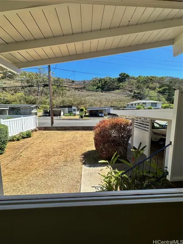 a view of swimming pool from a balcony