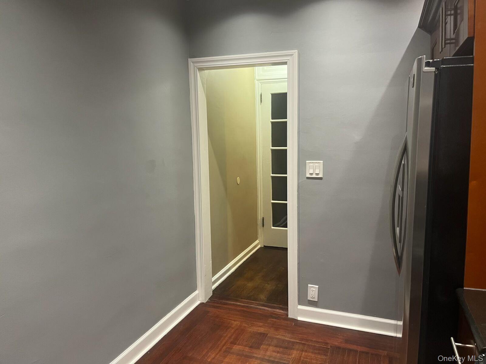 1270 White Plains Road, Unit 2 Bronx, NY 10472 - Photo 2 of 9 an empty room with wooden floor