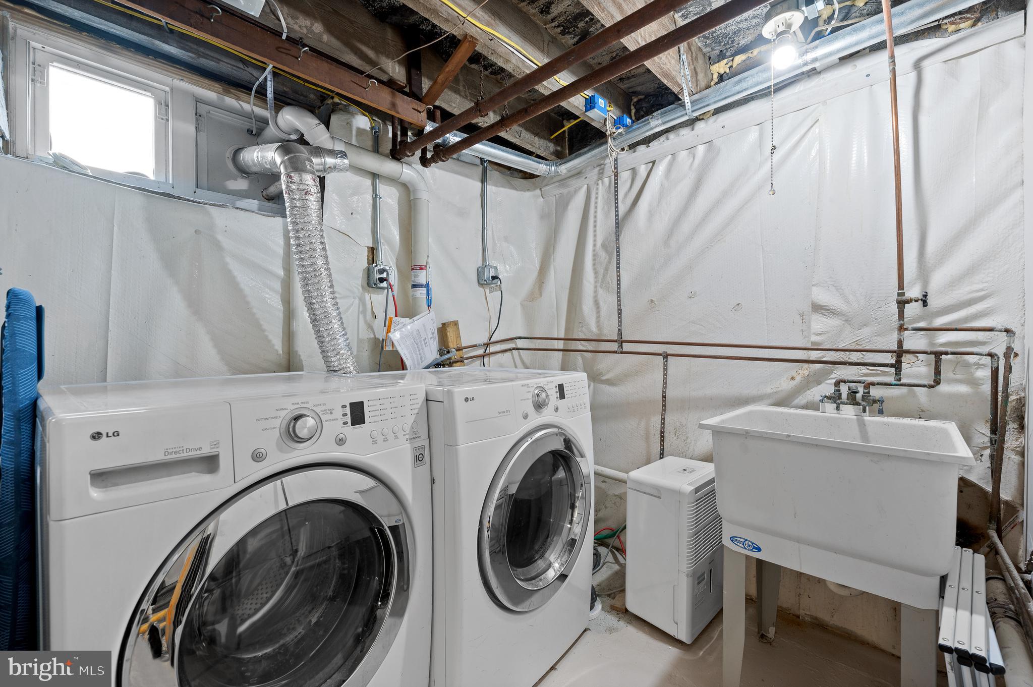 502 Beechwood Lane Narberth, PA 19072 - Photo 25 of 39 a utility room with dryer and washer