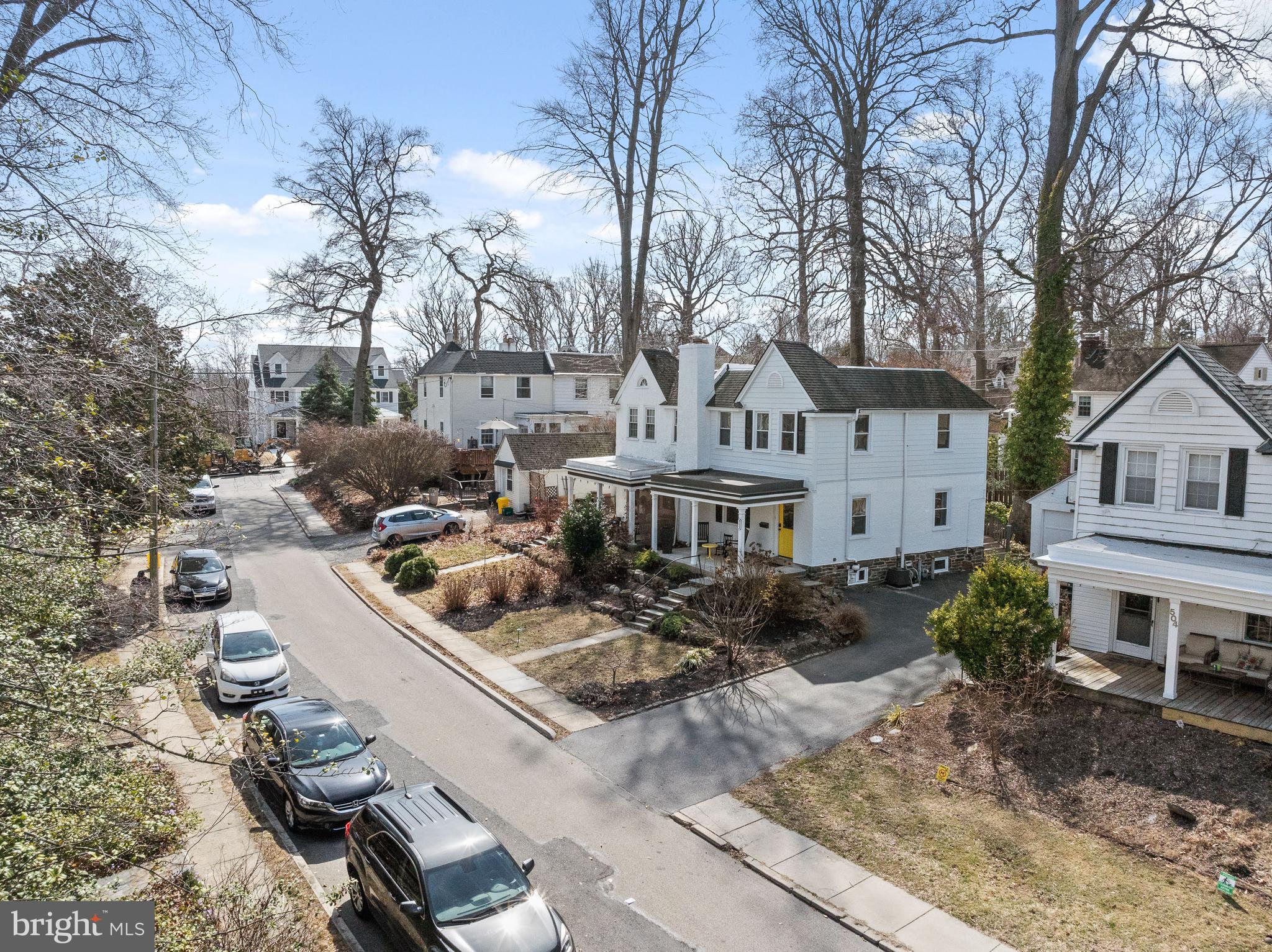 502 Beechwood Lane Narberth, PA 19072 - Photo 35 of 39 a front view of house with yard outdoor seating and covered with trees