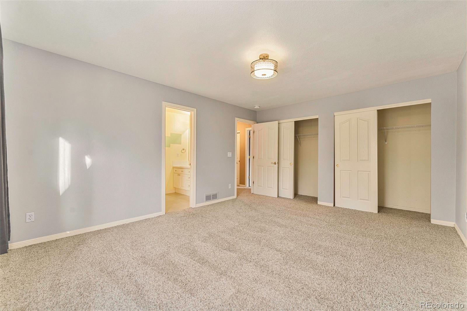 3042 Wyecliff Way Highlands Ranch, CO 80126 - Photo 22 of 40 a view of an empty room with a window