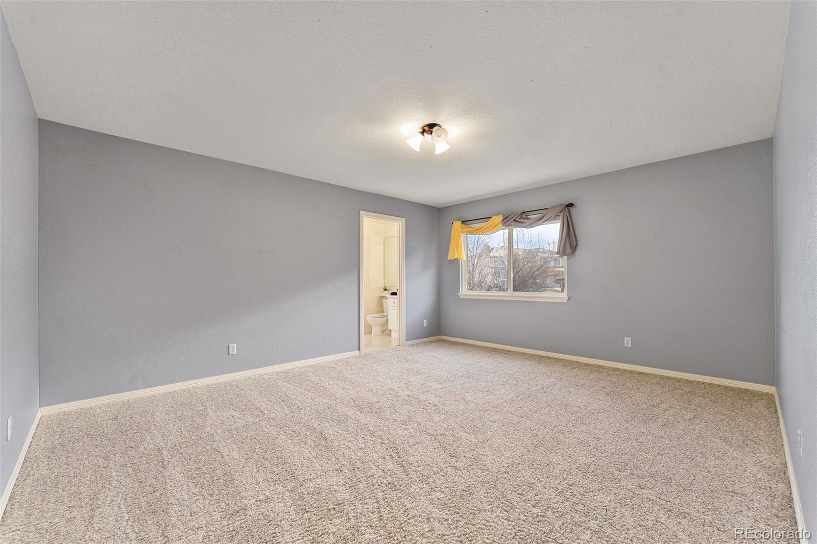 3042 Wyecliff Way Highlands Ranch, CO 80126 - Photo 23 of 40 a view of an empty room with window