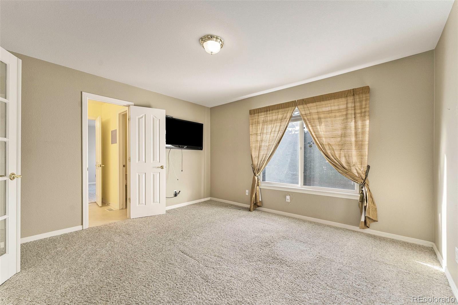 3042 Wyecliff Way Highlands Ranch, CO 80126 - Photo 30 of 40 a view of an empty room with a window