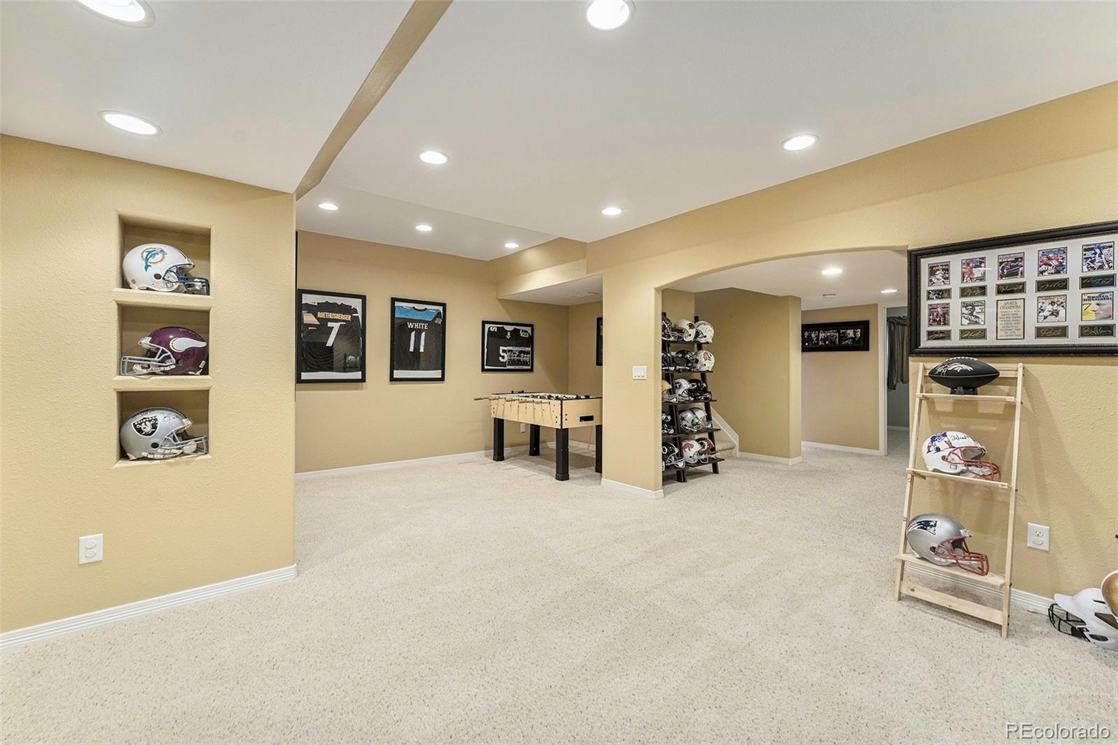 3042 Wyecliff Way Highlands Ranch, CO 80126 - Photo 32 of 40 a view of a big room with entryway table and windows