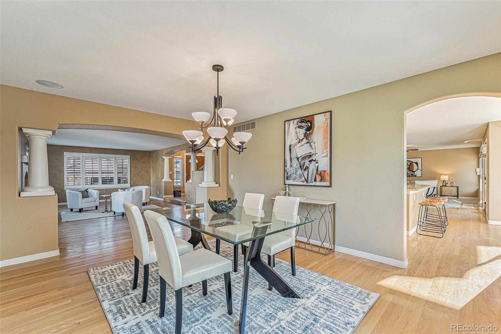 3042 Wyecliff Way Highlands Ranch, CO 80126 - Photo 6 of 40 a view of a dining room with furniture