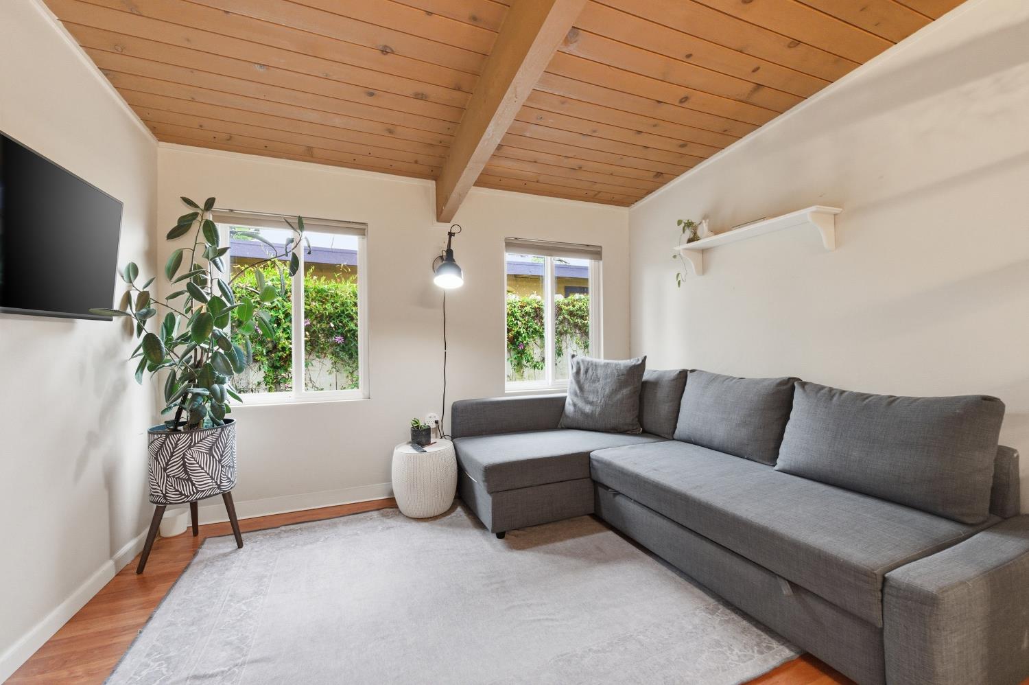 1301 Chestnut Lane Davis, CA 95616 - Photo 12 of 38 a living room with furniture and a large window