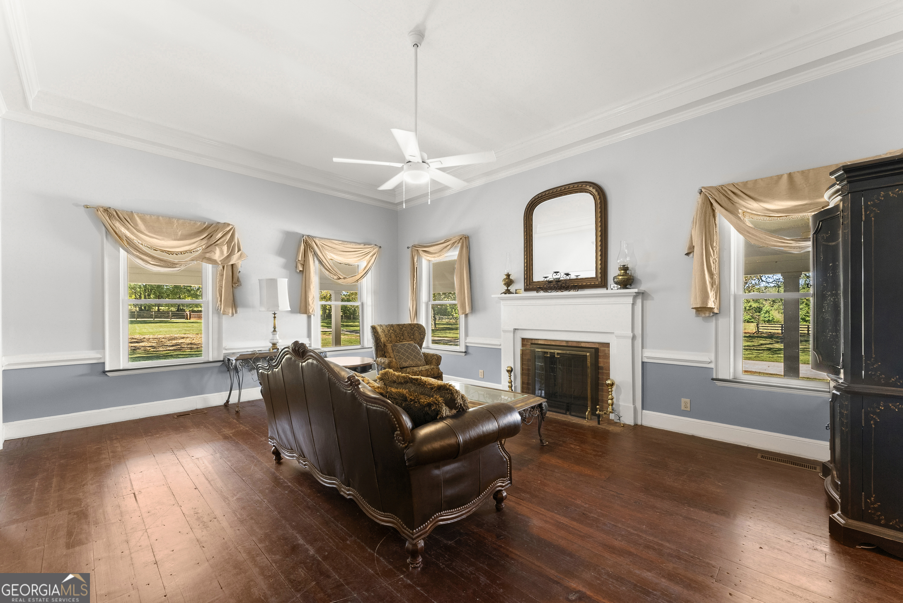 1972 Rest Haven Road Yatesville, GA 31097 - Photo 22 of 52 a living room with furniture fireplace and window