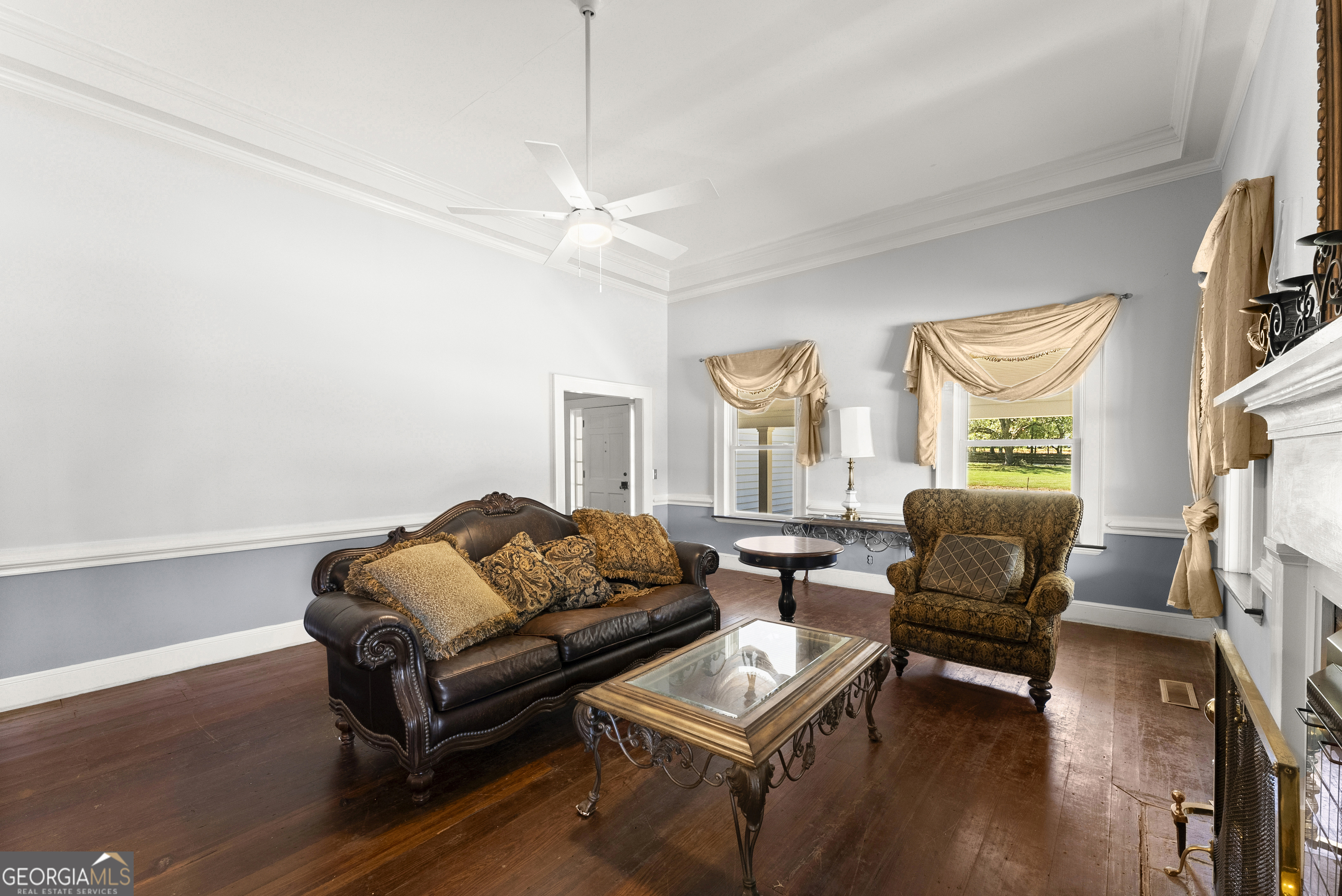 1972 Rest Haven Road Yatesville, GA 31097 - Photo 23 of 52 a living room with furniture rug and wooden floor