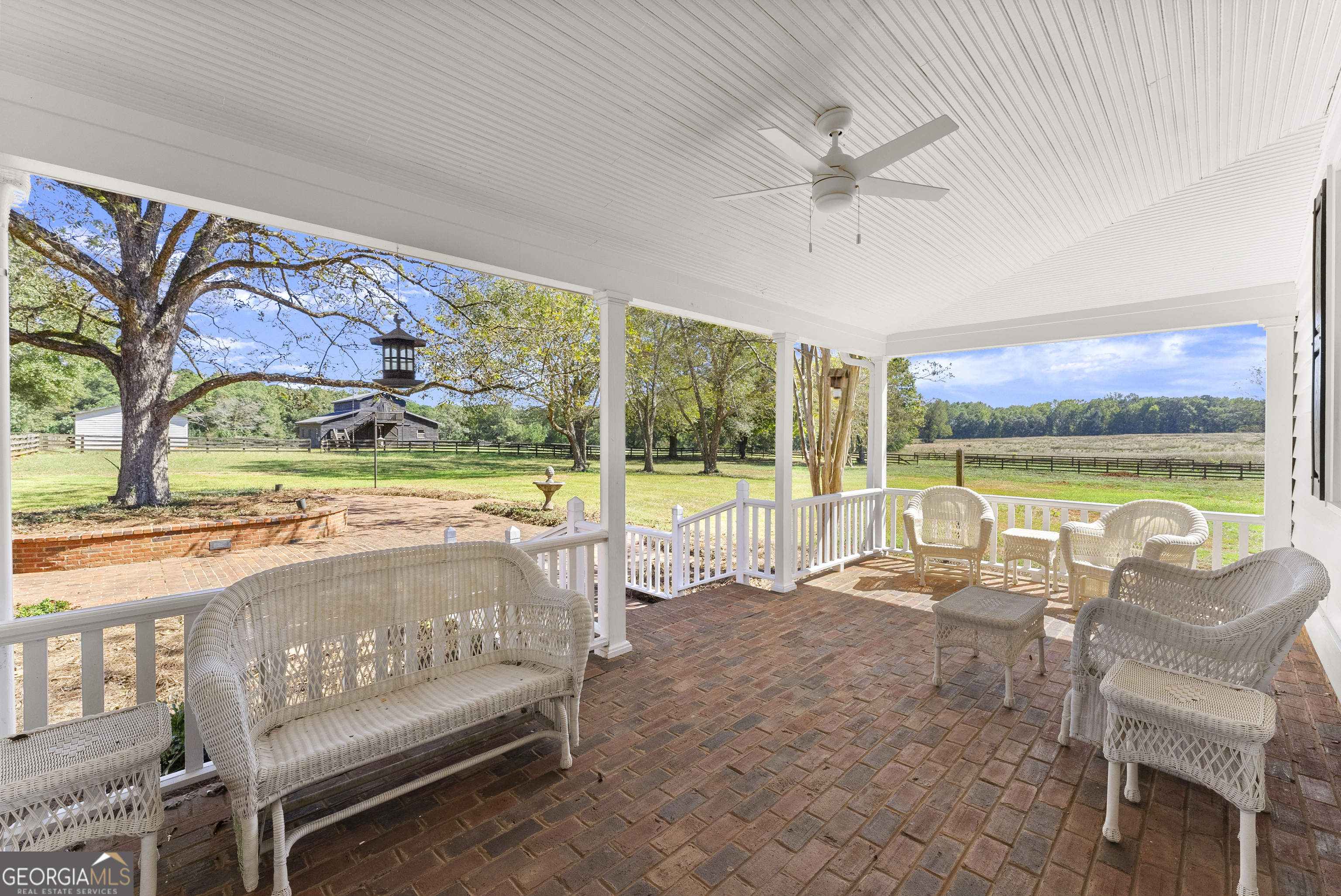 1972 Rest Haven Road Yatesville, GA 31097 - Photo 32 of 52 a living room with a floor to ceiling window and pool